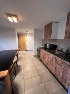 Η κουζίνα ή μικρή κουζίνα στο AM Apartment Sud20