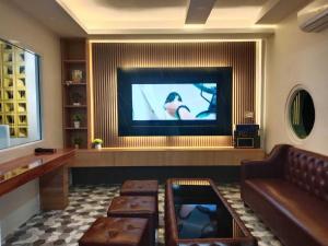 Televisyen dan/atau pusat hiburan di Rungmod 99 Villa