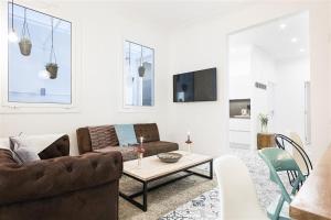 Televízia a/alebo spoločenská miestnosť v ubytovaní Apartment in downtown Barcelona - Vintage