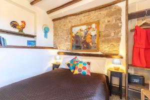 En eller flere senge i et værelse på Le Fanciulle - Alexandra