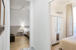 Posteľ alebo postele v izbe v ubytovaní Apartment in downtown Barcelona - Vintage