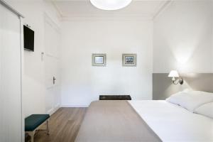 Posteľ alebo postele v izbe v ubytovaní Apartment in downtown Barcelona - Vintage