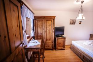 Postel nebo postele na pokoji v ubytování Mlýn Kozlovice