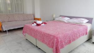 Postel nebo postele na pokoji v ubytování Villa Aydın 2