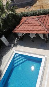 Bazén v ubytování Villa Aydın 2 nebo v jeho okolí