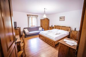 Postel nebo postele na pokoji v ubytování Mlýn Kozlovice