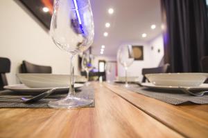 A television and/or entertainment centre at RentalSevilla Looks Pretty and modern