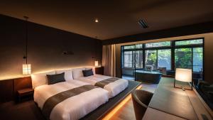Postel nebo postele na pokoji v ubytování Nasu-Onsen Shinshun no Kago Hewitt Resort