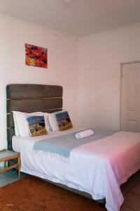 a bedroom with two beds in a room at East griqualand Accomodation and Conference in Kokstad