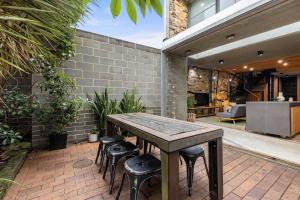 Zona d'estar a Modern & Stylish 3BR in Redfern
