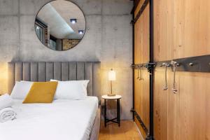Llit o llits en una habitació de Modern & Stylish 3BR in Redfern