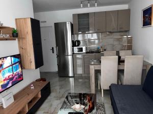 Kuchyň nebo kuchyňský kout v ubytování Angel Apartment Srebrno jezero