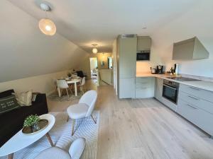 Kuchyň nebo kuchyňský kout v ubytování Newly built apartment in Höllviken + 9 fotografií