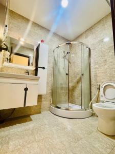 Koupelna v ubytování Phú Gia Hotel 99 Đường D1, KDC Him Lam, Tân Hưng, Quận7