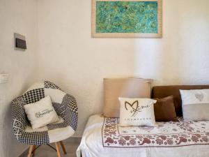 Postel nebo postele na pokoji v ubytování Apartment D4 - I1- Baia de Bahas by Interhome