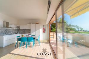 Η κουζίνα ή μικρή κουζίνα στο White Sea House - Trilocale Moderno e spazioso +22 φωτογραφίες