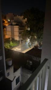 a view of a street at night from a balcony at Joes Court in Misraħ Il-Barrieri