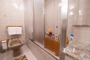 a bathroom with a shower and a sink at Domus61 in Marsala
