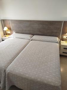 Postel nebo postele na pokoji v ubytování Apartamento centrico