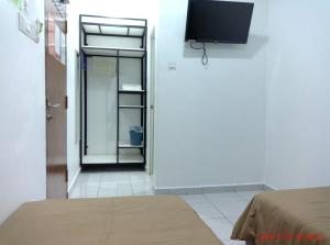 TV a/nebo společenská místnost v ubytování Gemilang Hotel Klang
