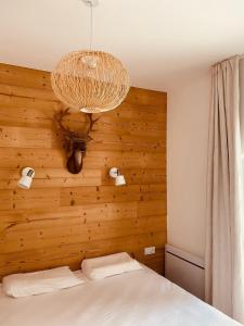Postel nebo postele na pokoji v ubytování Bel appartement 8p pied des pistes Val Louron
