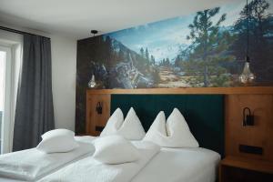 Ein Bett oder Betten in einem Zimmer der Unterkunft Gasthof Schütthof