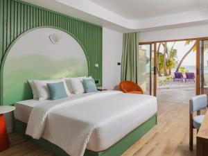 Ліжко або ліжка в номері Villa Park Sun Island Resort - Complimentary One Way Domestic Transportation for stays of 7 nights and more 01 April to 30 September 2025