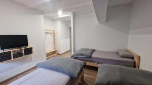 Posteľ alebo postele v izbe v ubytovaní Albergue La Incera