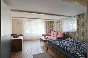 Postel nebo postele na pokoji v ubytování Guest house Kajaki-Ragaciems