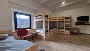 Postel nebo postele na pokoji v ubytování Albergue La Incera