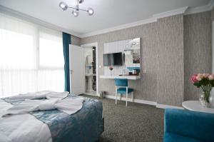 Postel nebo postele na pokoji v ubytování Hill Life Hotel