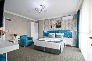 Postel nebo postele na pokoji v ubytování Hill Life Hotel