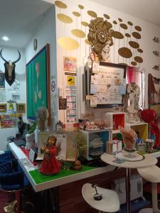 A kitchen or kitchenette at EcoHouse & BioVeg Café