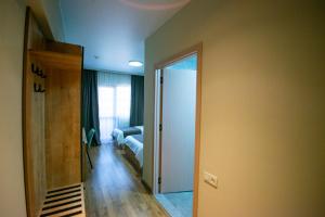 Postel nebo postele na pokoji v ubytování Astana Palace