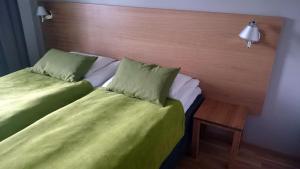 Postel nebo postele na pokoji v ubytování Finlandia Hotel Imatran Kylpylä Spa