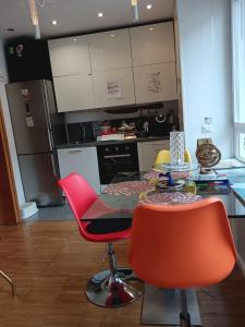 A kitchen or kitchenette at EcoHouse & BioVeg Café