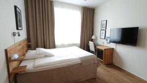 Voodi või voodid majutusasutuse Best Western Centralhotellet toas