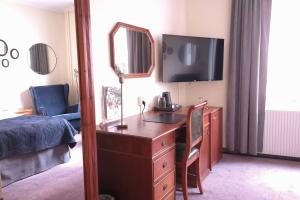 Televiisor ja/või meelelahutuskeskus majutusasutuses Best Western Centralhotellet