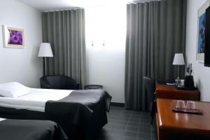 Voodi või voodid majutusasutuse Best Western Centralhotellet toas