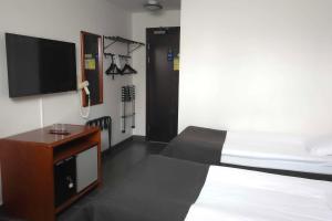 TV a/nebo společenská místnost v ubytování Best Western Centralhotellet