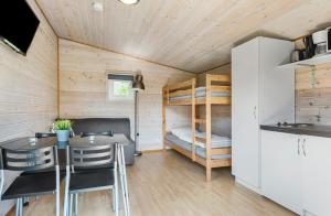 Kuchyň nebo kuchyňský kout v ubytování First Camp Ajstrup Strand