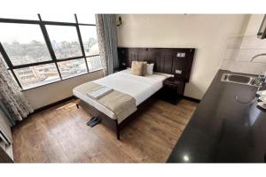 Postel nebo postele na pokoji v ubytování Hemak Suites Hotel + 37 fotografií