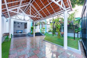 Taman di luar Victory Villa - Sân Vườn - Hồ Bơi - Karaoke - Gần Biển Bãi Sau +48 gambar
