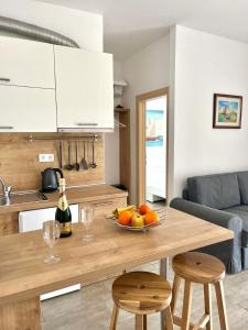 Kuchyň nebo kuchyňský kout v ubytování Apartments ZINA