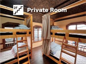 Voodi või voodid majutusasutuse Hostel Miyagawa by Murasaki toas