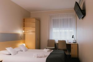 TV a/nebo společenská místnost v ubytování Quality Silesian Hotel