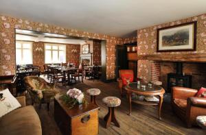 Area soggiorno di The Stag and Huntsman at Hambleden