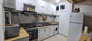 Η κουζίνα ή μικρή κουζίνα στο Au paradis de fadila +13 φωτογραφίες