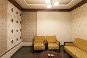 Uma área de estar em K Tree Boutique Hotel, Kolhapur