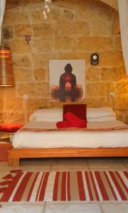 Postel nebo postele na pokoji v ubytování Ta' Didi B&B